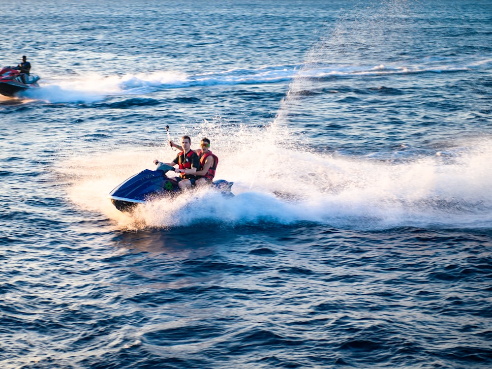 A personal watercraft cutting across open coastal water.
