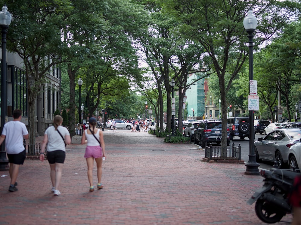 A historic brick facade and cast iron detailing on a city street.
